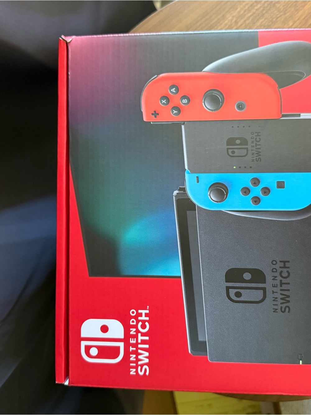 Nintendo Switch Console with Red and Blue Joy-Con Controllers